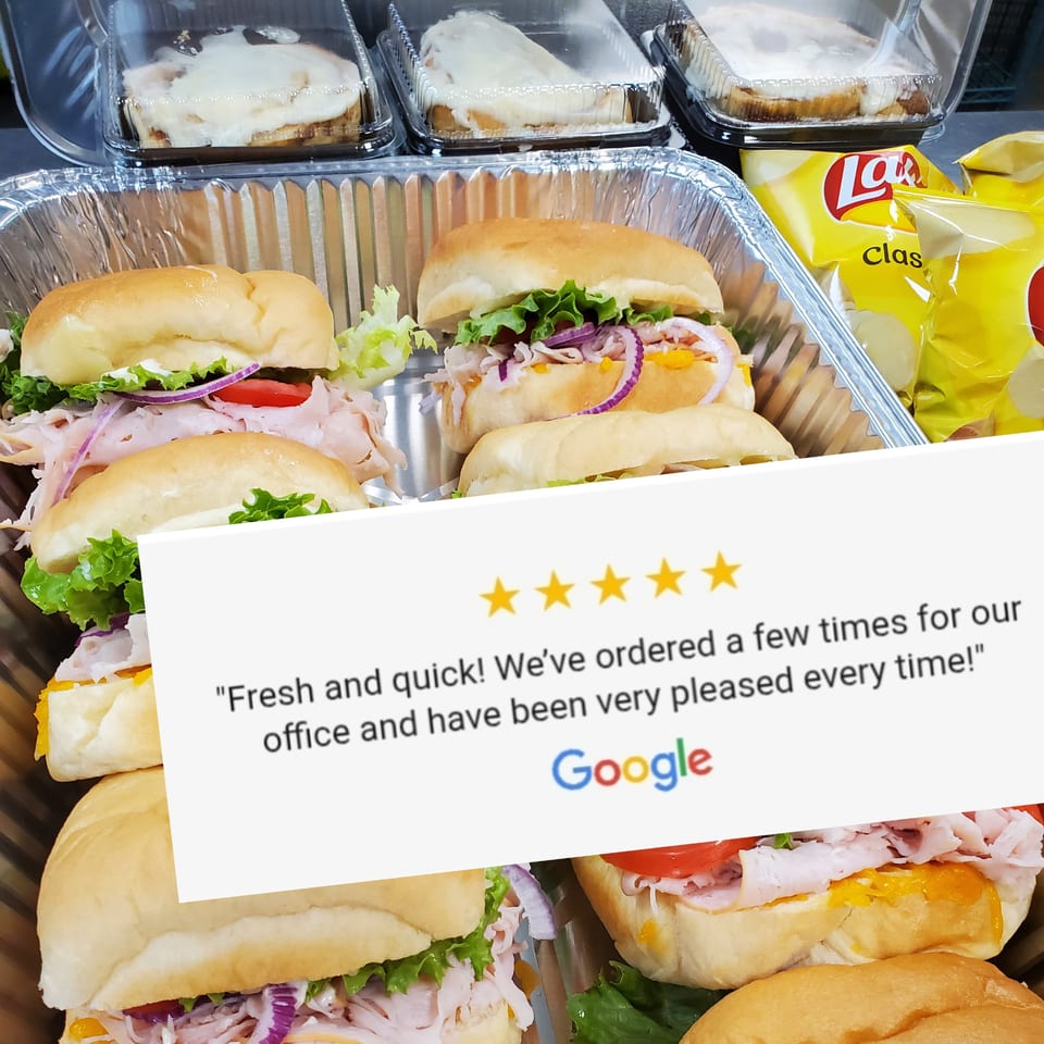 Field House Deli catering tray with sandwiches, chips, and pastries, overlaid with a Google review.
